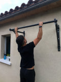 Chaise romaine de musculation en usage dans un home-gym